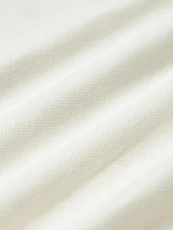 Bestickte Baumwoll-Kissenhülle Izad mit Hoch-Tief-Struktur