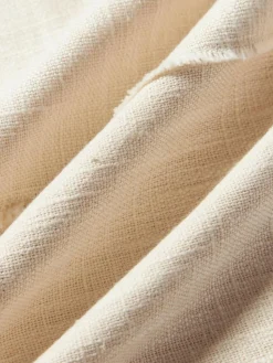 Handgewebte Baumwoll-Kissenhülle Terre mit dekorativer Naht