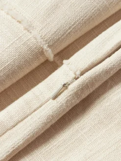 Handgewebte Baumwoll-Kissenhülle Terre mit dekorativer Naht