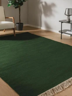 Handgewebter Wollteppich Liv mit Fransen