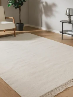 Handgewebter Wollteppich Liv mit Fransen