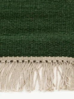 Handgewebter Wollteppich Liv mit Fransen
