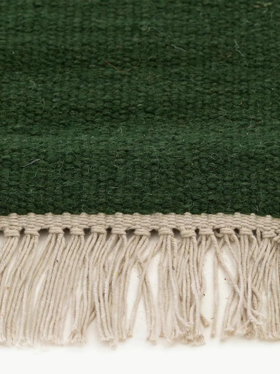 Handgewebter Wollteppich Liv mit Fransen