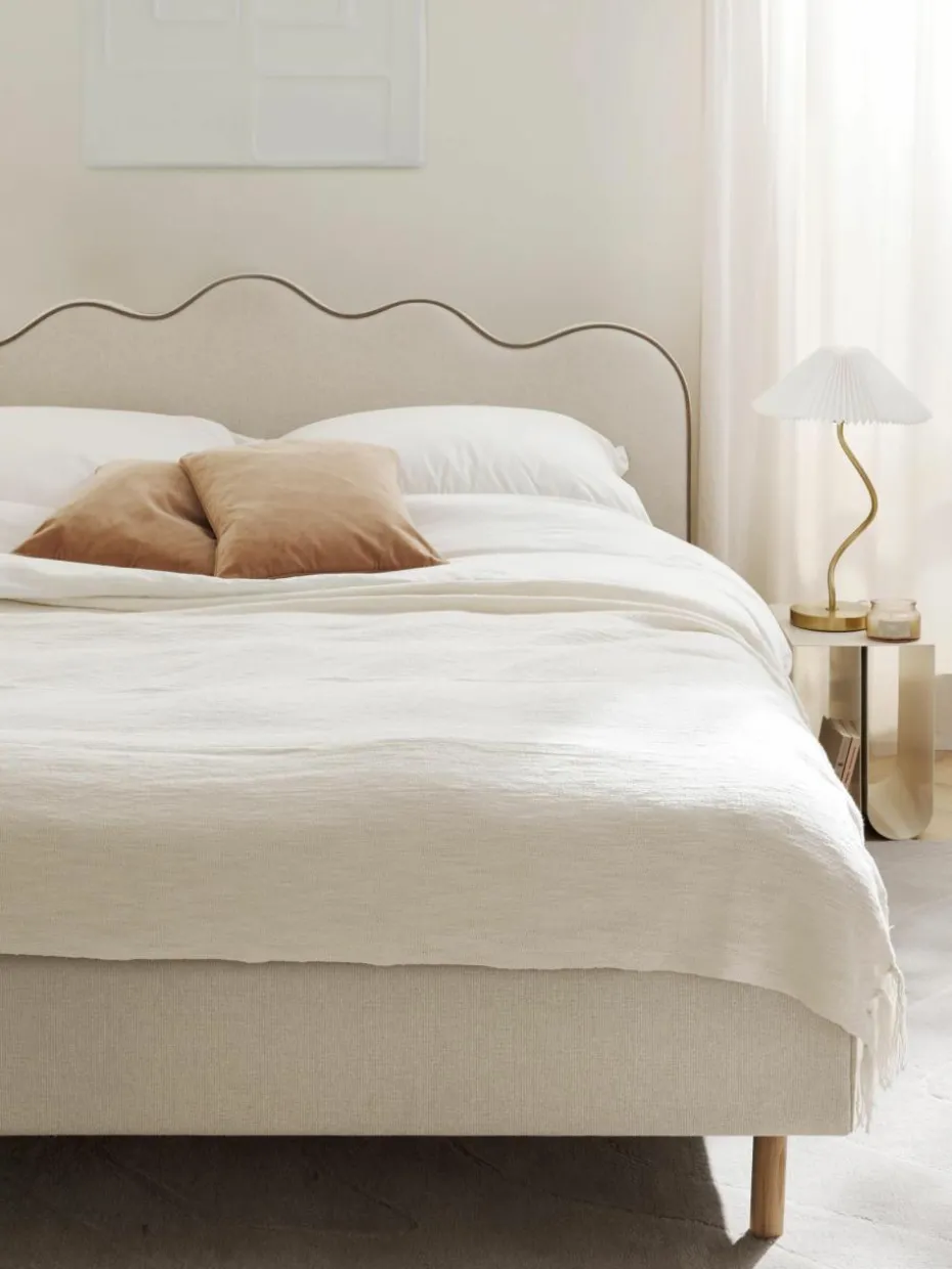 Polsterbett Romy mit gewelltem Kopfteil