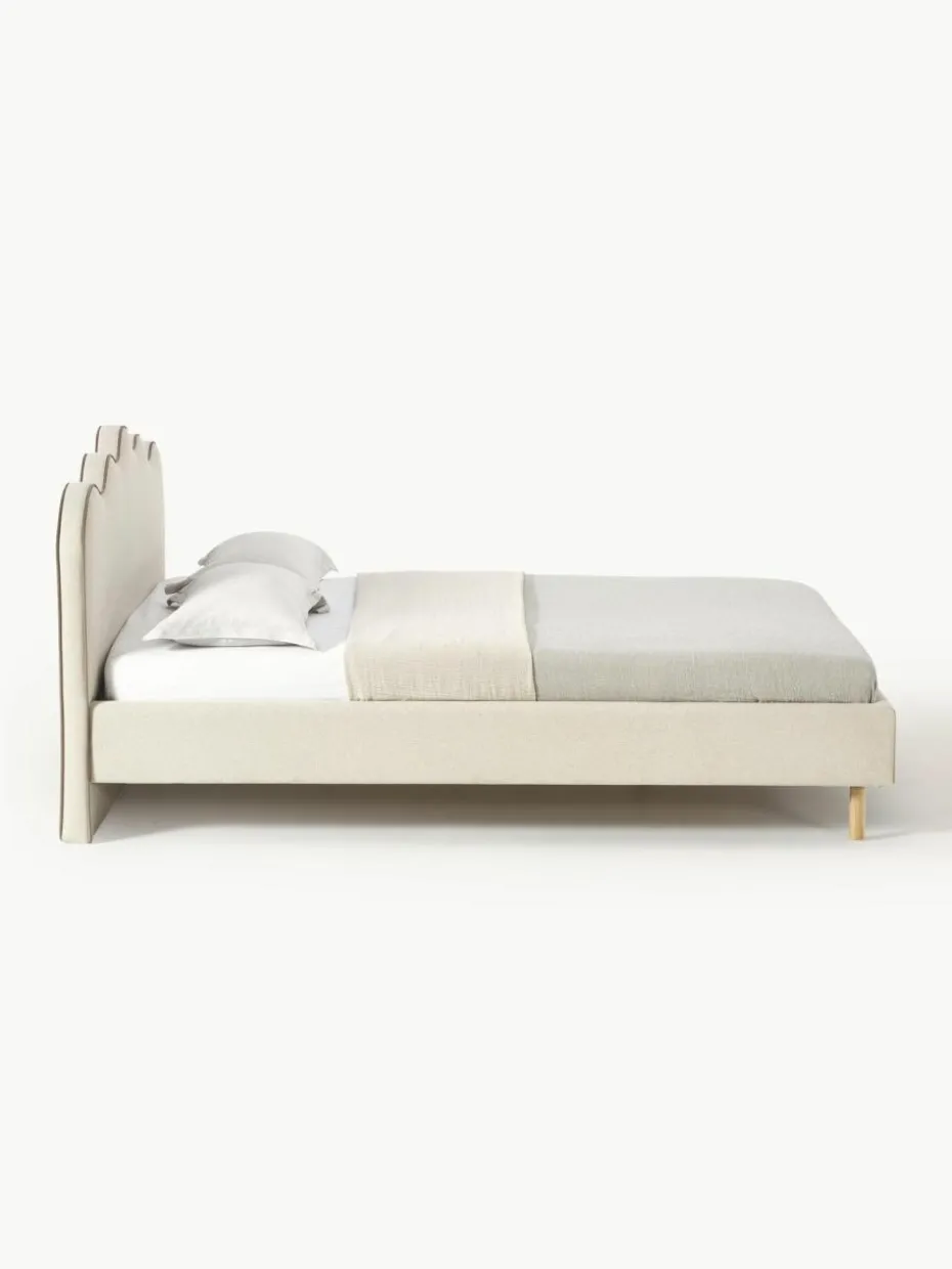 Polsterbett Romy mit gewelltem Kopfteil