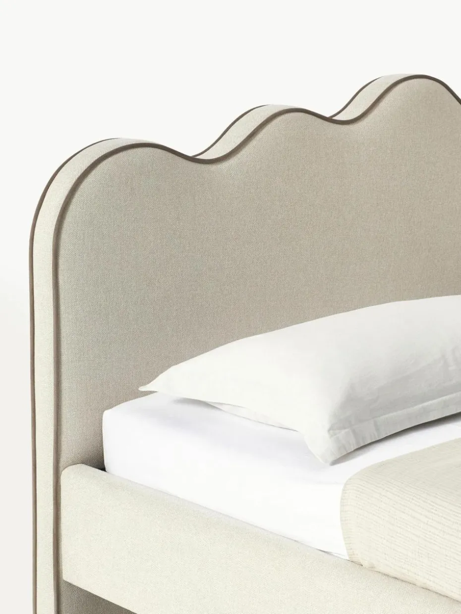 Polsterbett Romy mit gewelltem Kopfteil