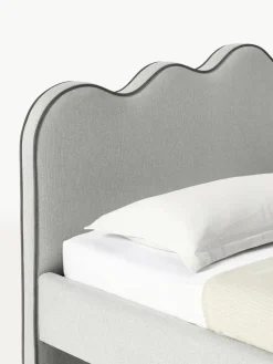 Polsterbett Romy mit gewelltem Kopfteil