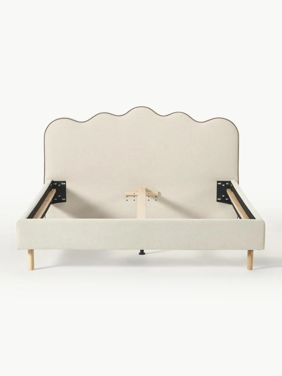 Polsterbett Romy mit gewelltem Kopfteil