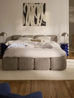 Polsterbett Tayla aus Teddy-Bouclé mit Stauraum