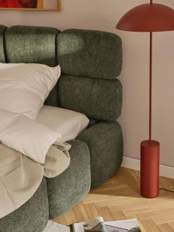 Polsterbett Tayla aus Teddy-Bouclé mit Stauraum